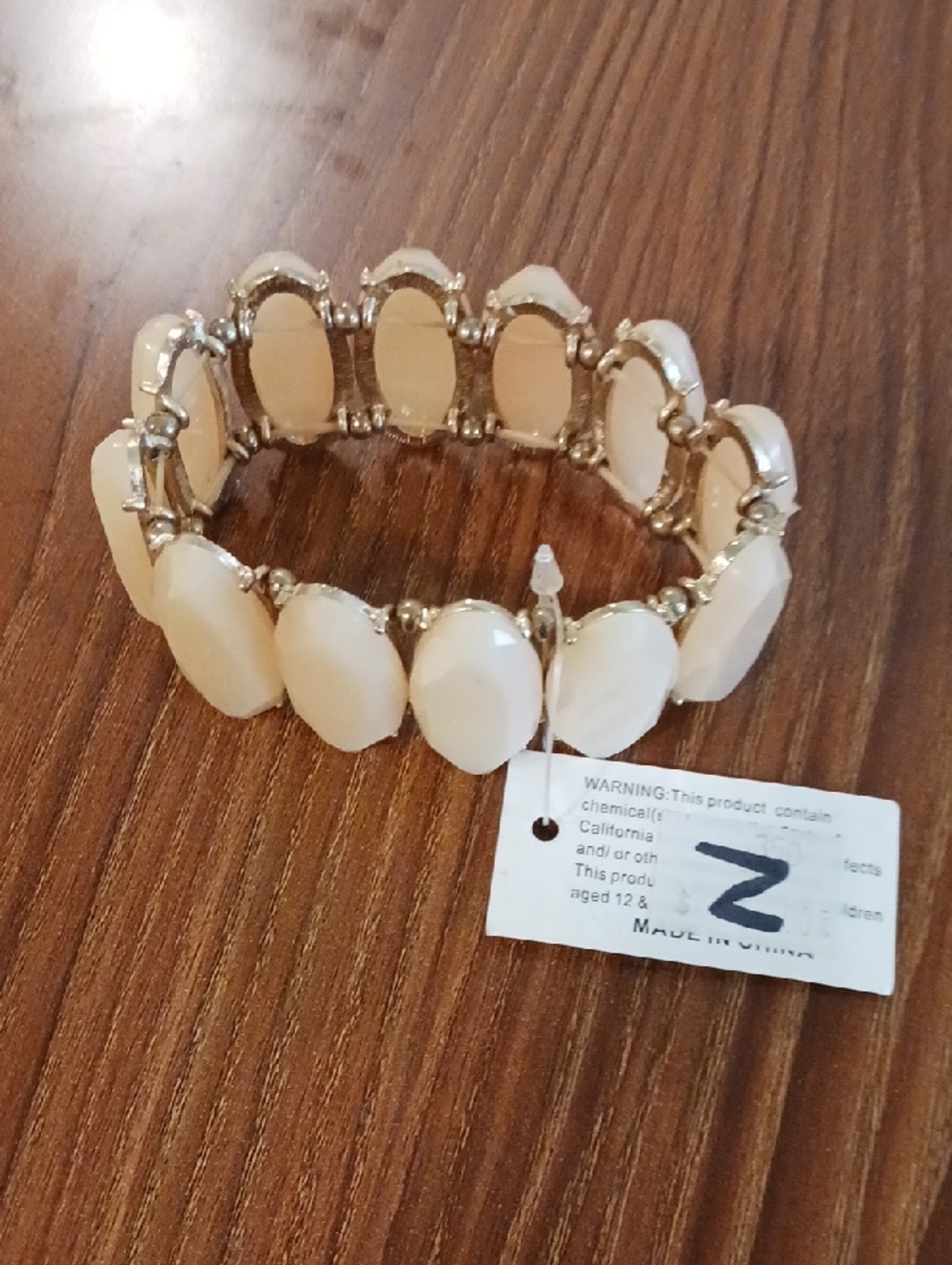 Women’s Cream/Peach Stretch Bracelet with Gold Accents